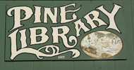 Sign that reads Pine Library